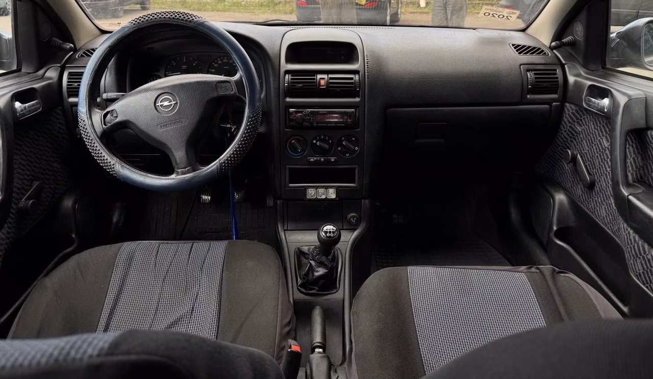 Opel Astra фото 10
