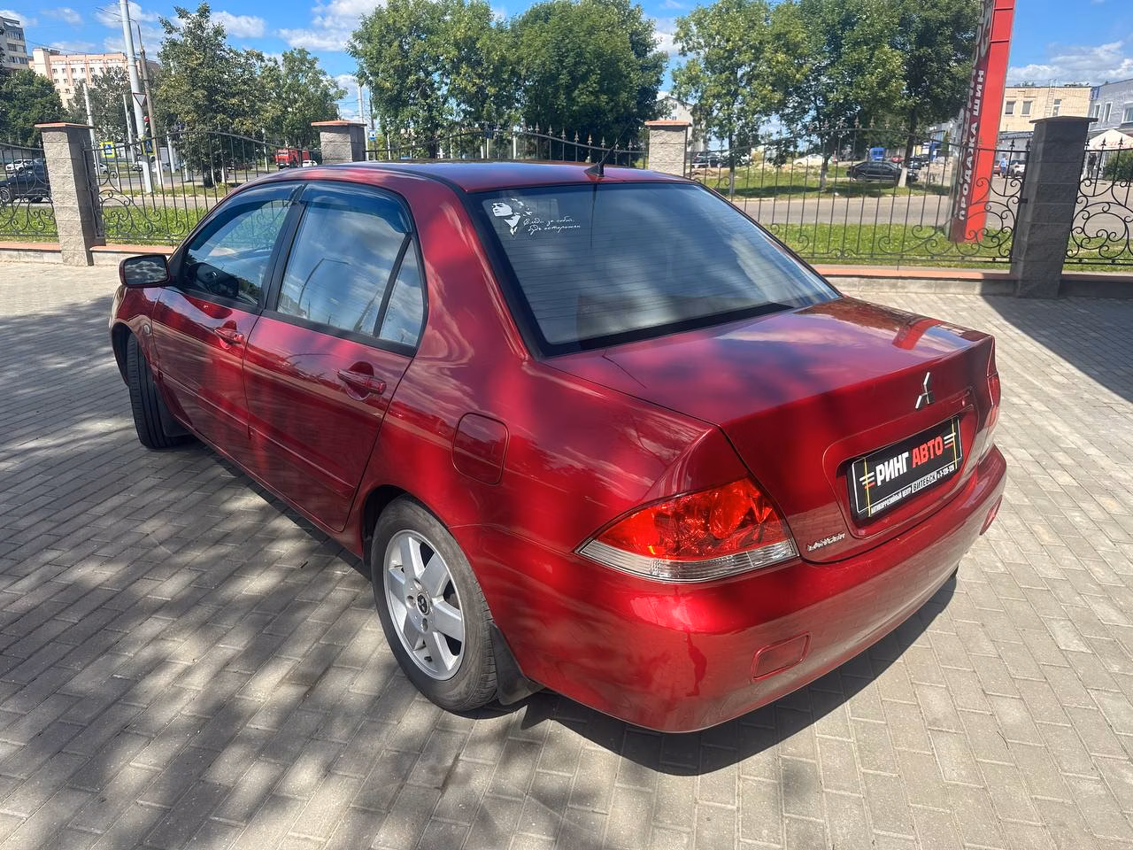 Mitsubishi Lancer фото 7