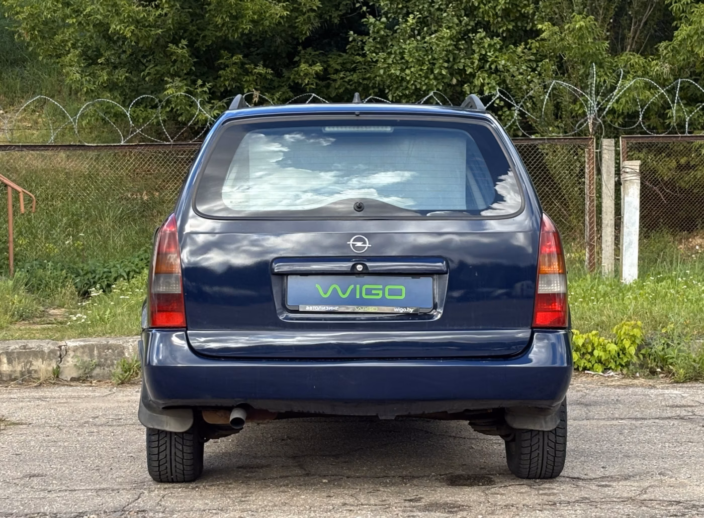 Opel Astra фото 6