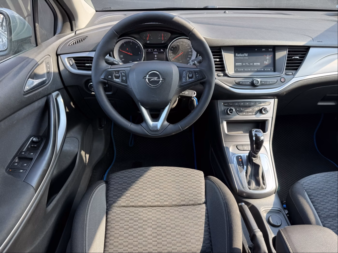 Opel Astra фото 10