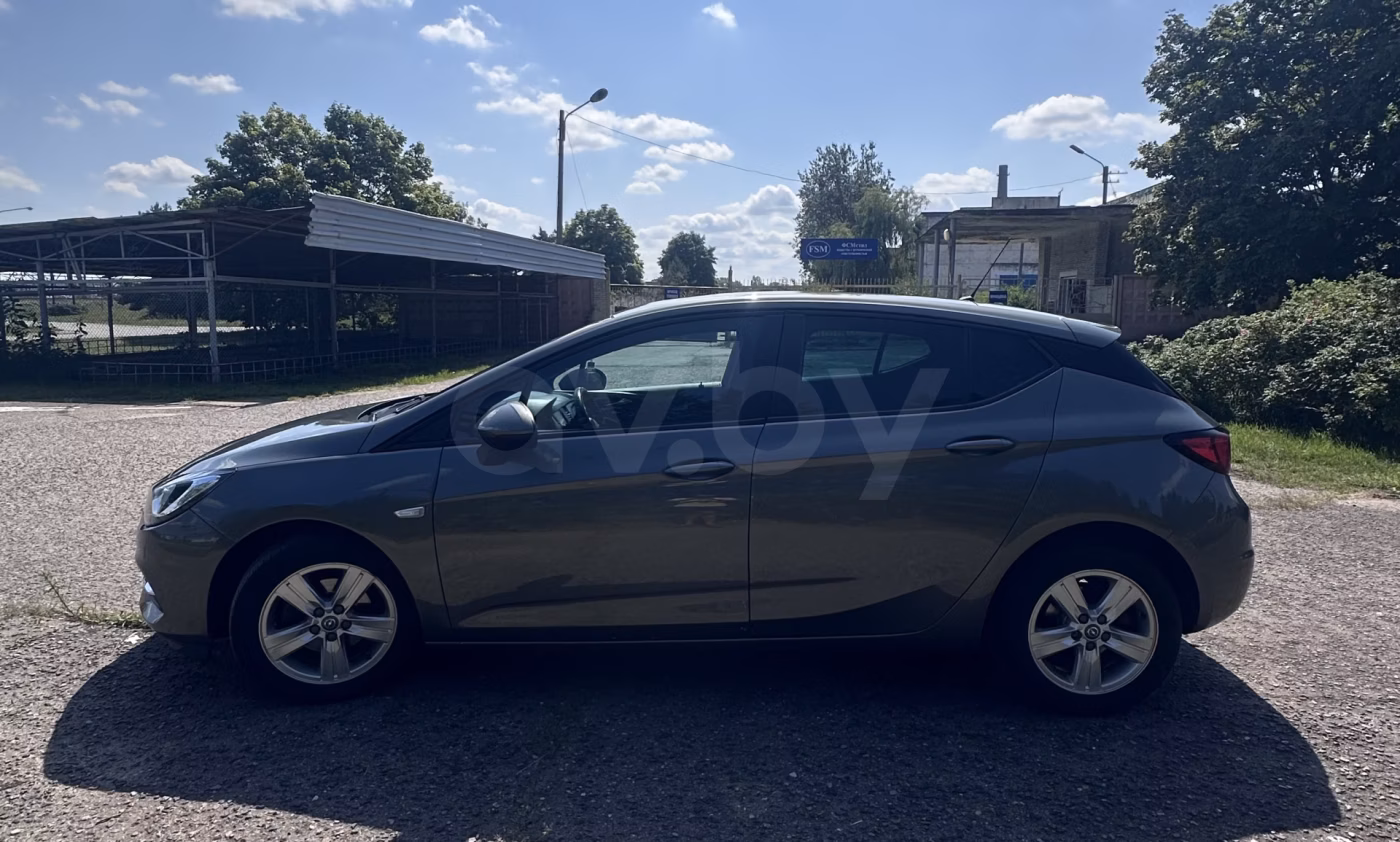 Opel Astra фото 9