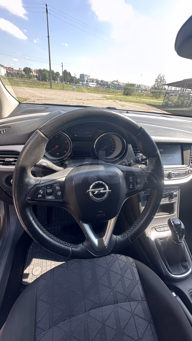 Opel Astra фото 10
