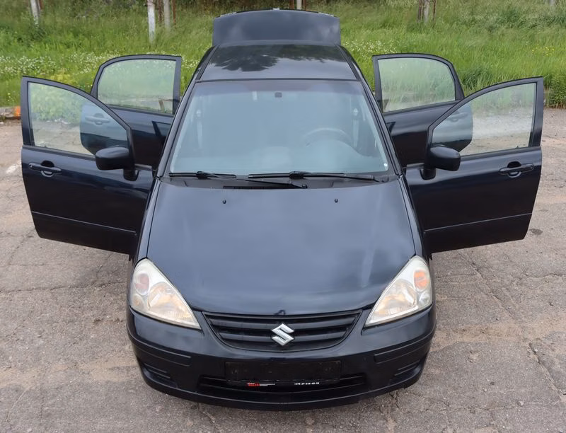 Suzuki Liana фото 4