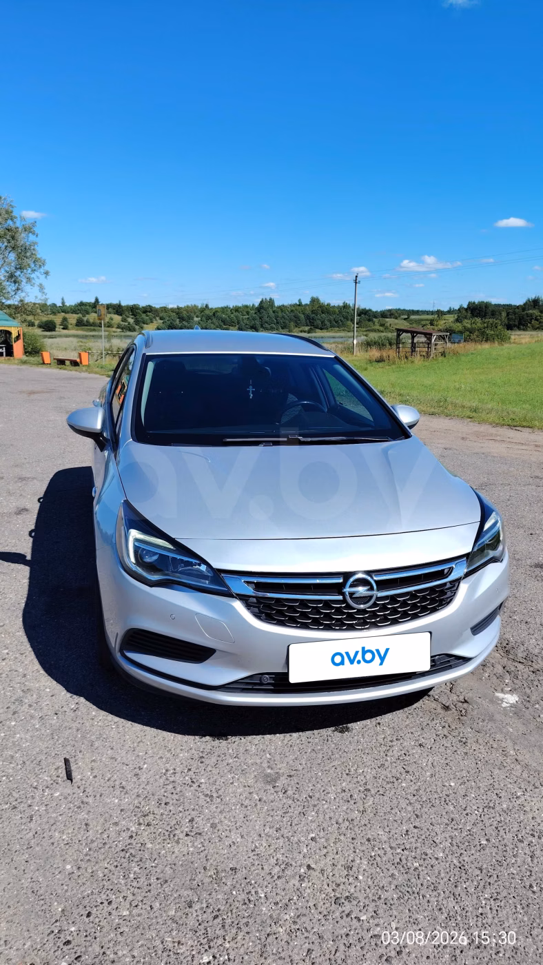 Opel Astra фото 2
