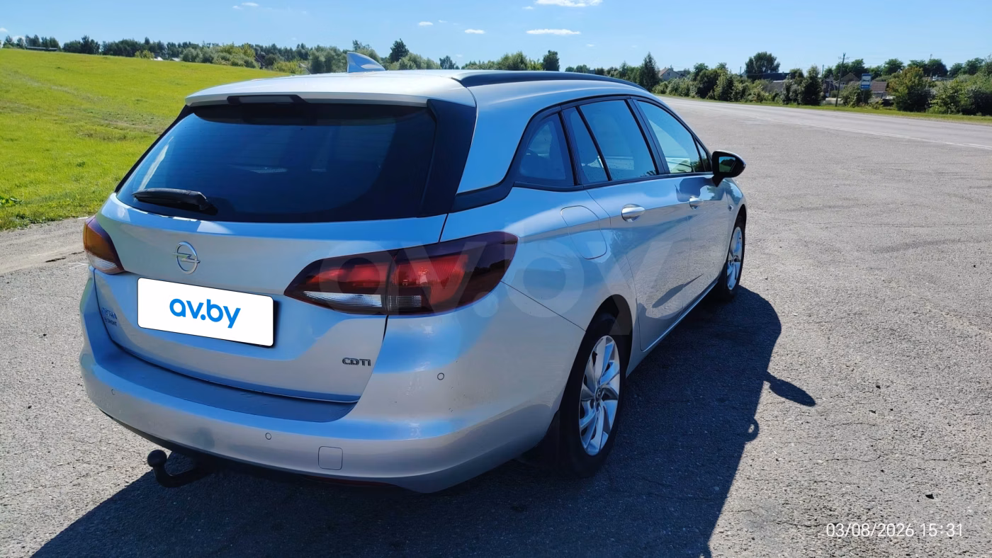 Opel Astra фото 5