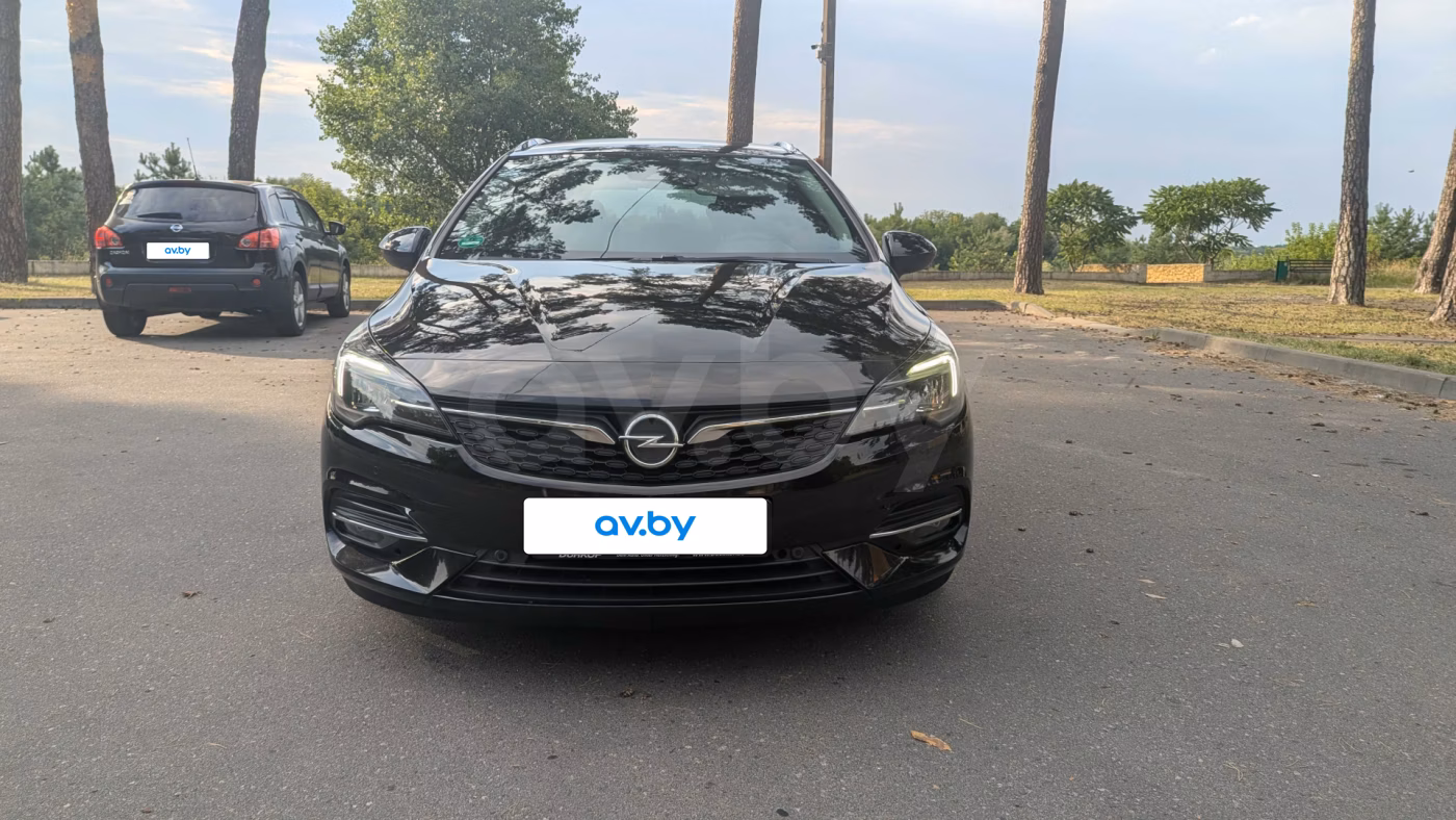 Opel Astra фото 9