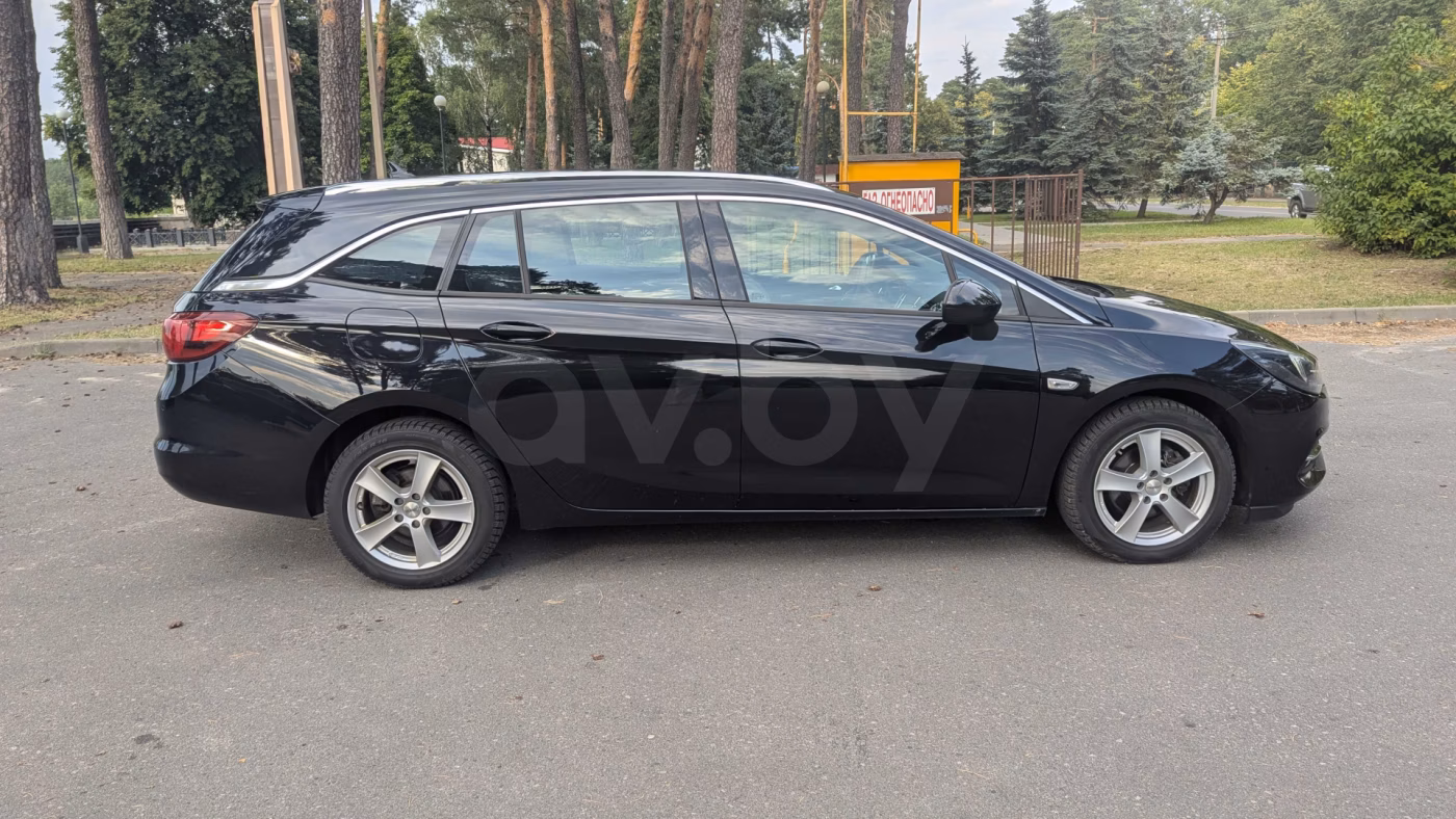 Opel Astra фото 7