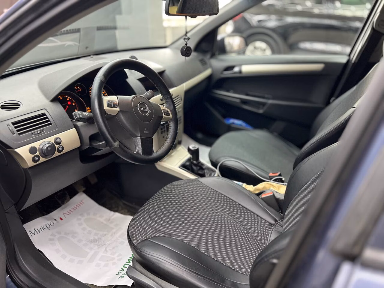 Opel Astra фото 7