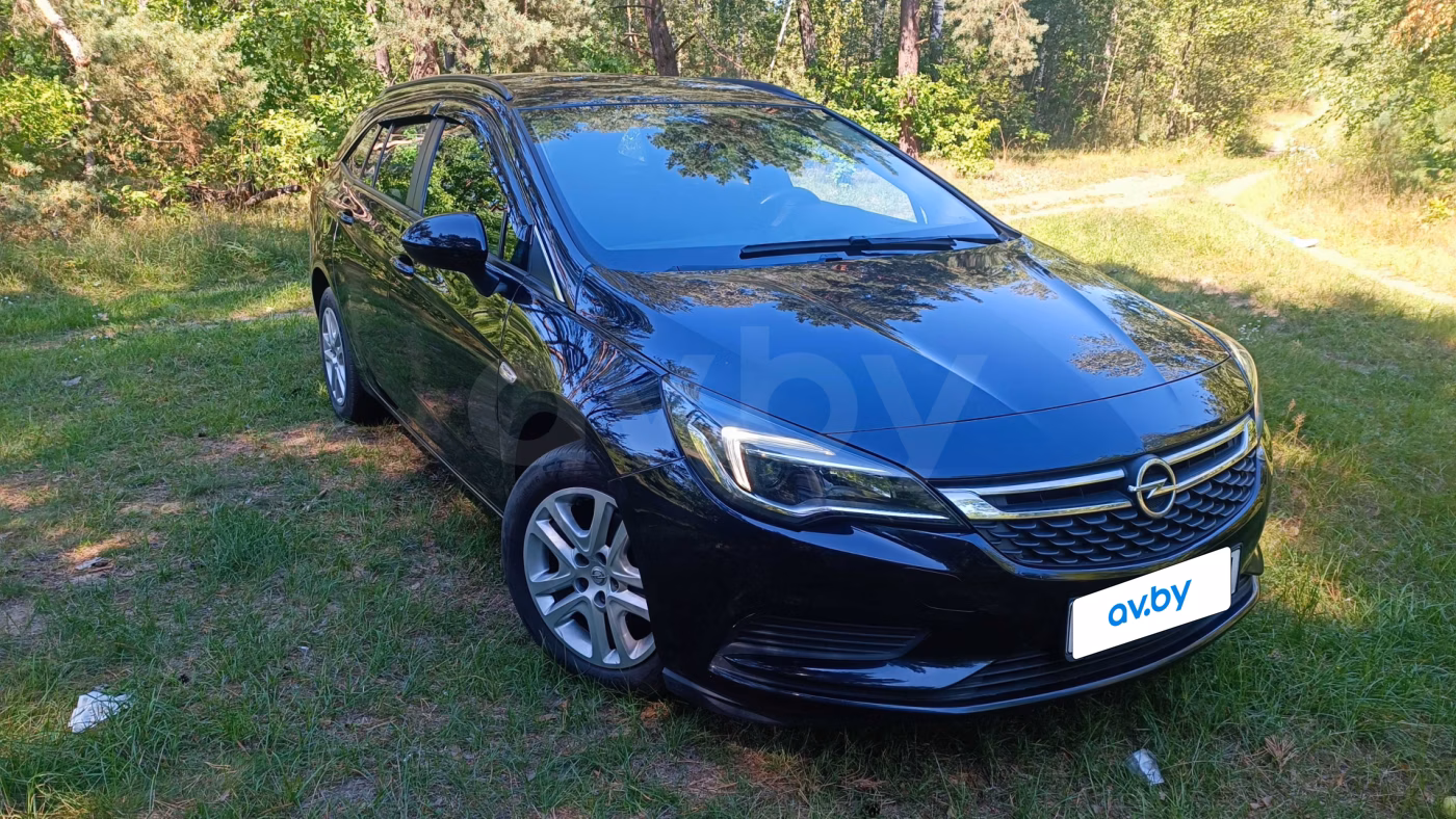 Opel Astra фото 3