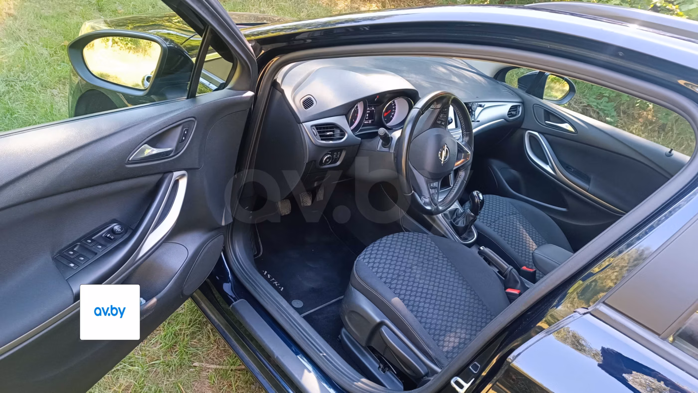 Opel Astra фото 6