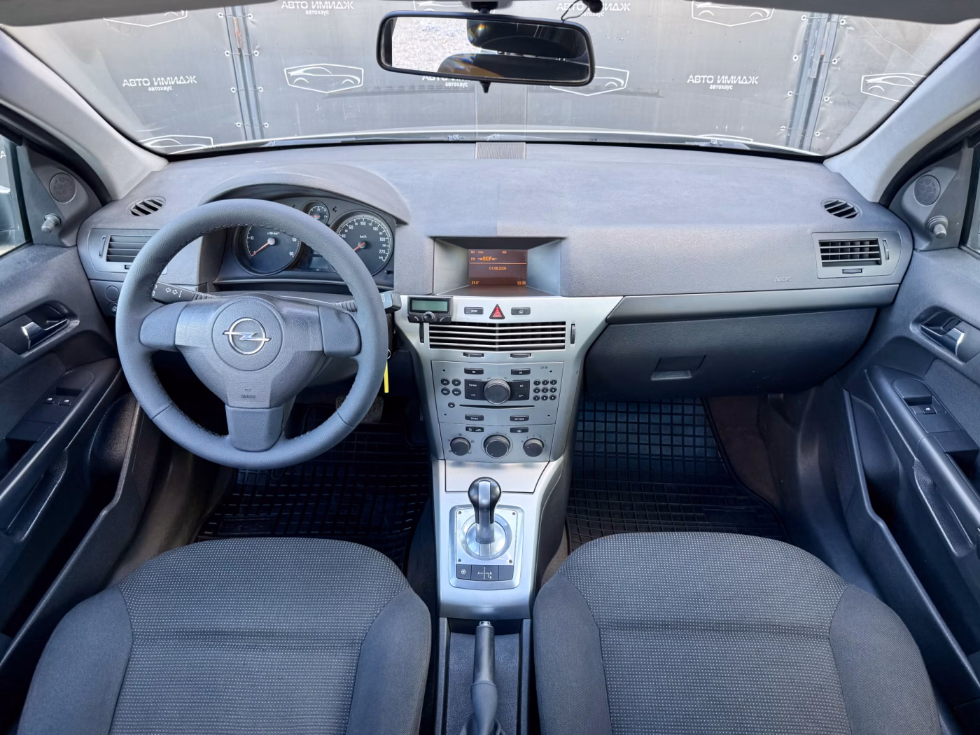 Opel Astra фото 15