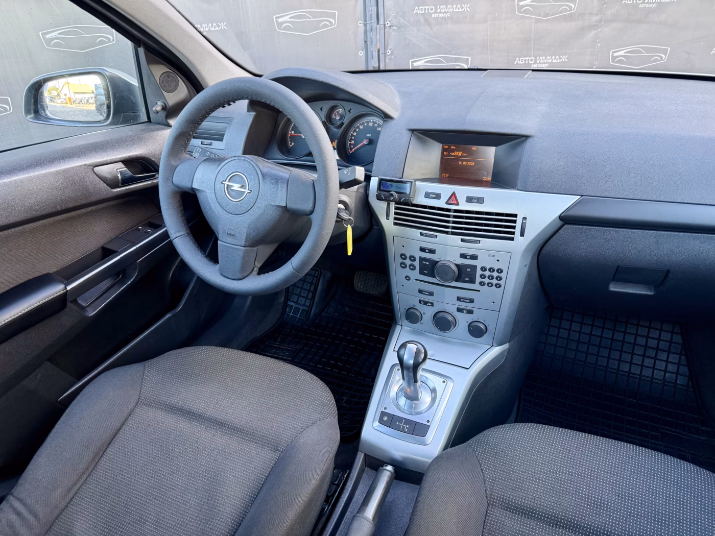 Opel Astra фото 11