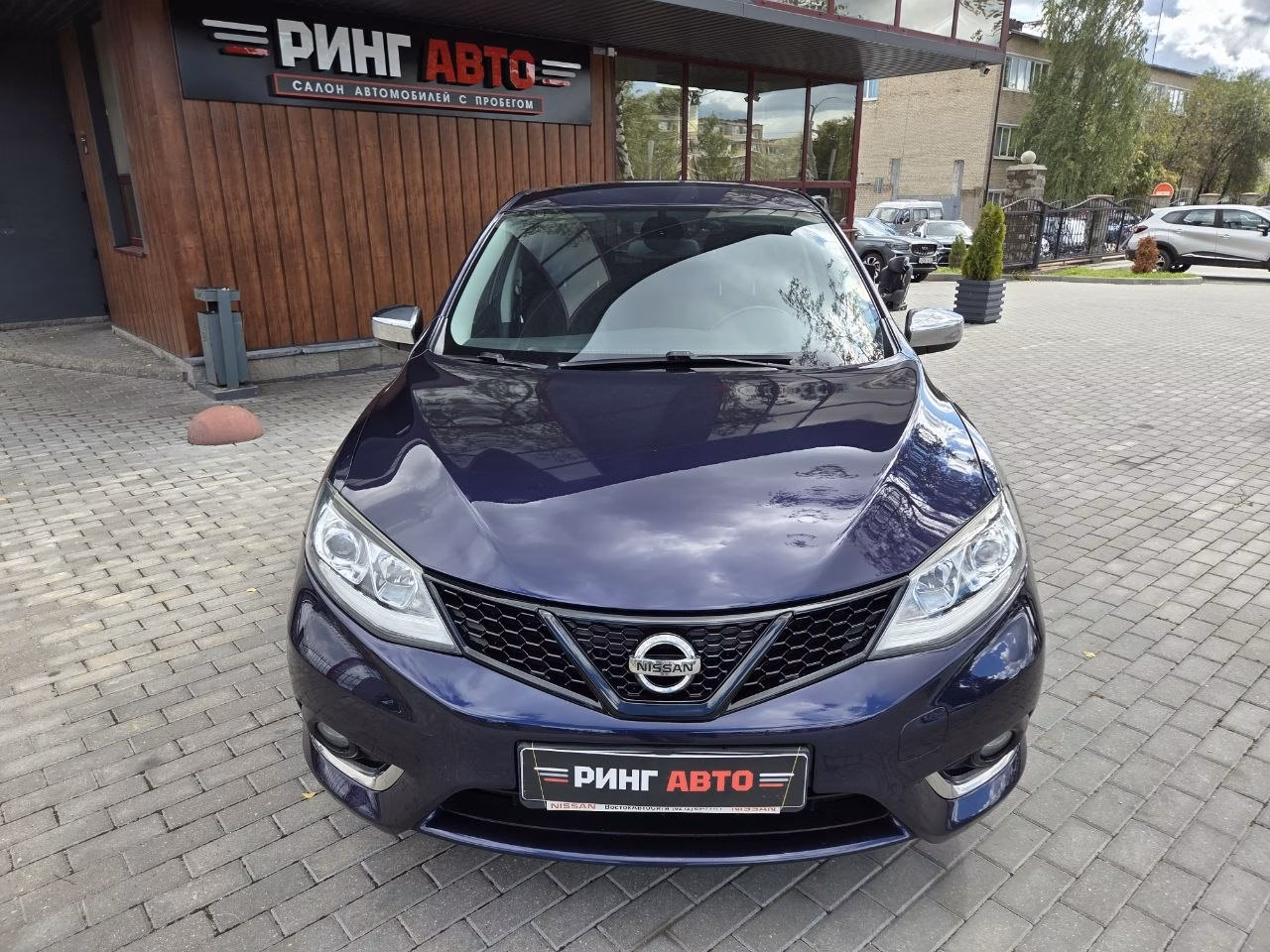 Nissan Tiida фото 2