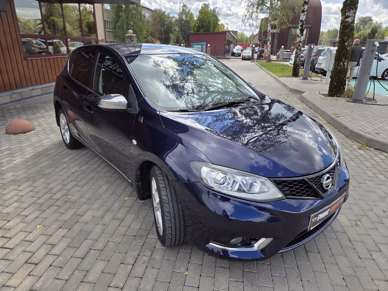 Nissan Tiida фото 3