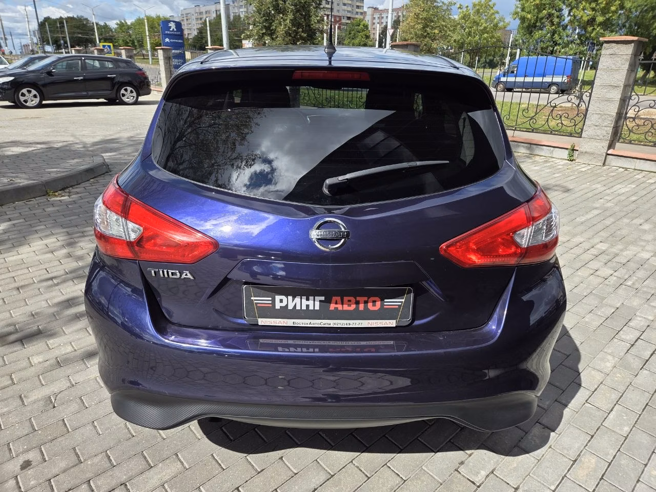 Nissan Tiida фото 6