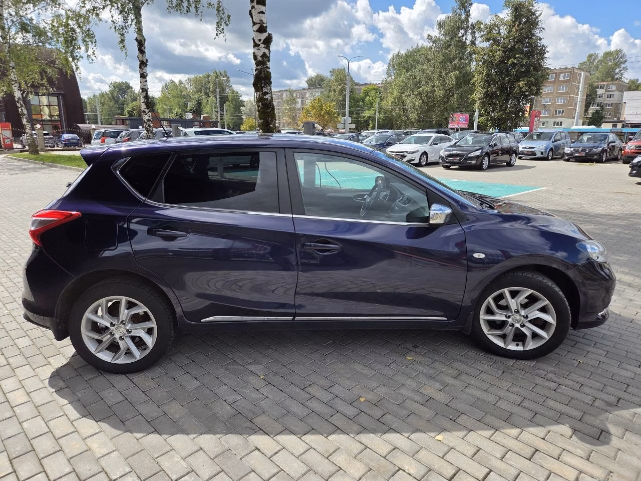 Nissan Tiida фото 4