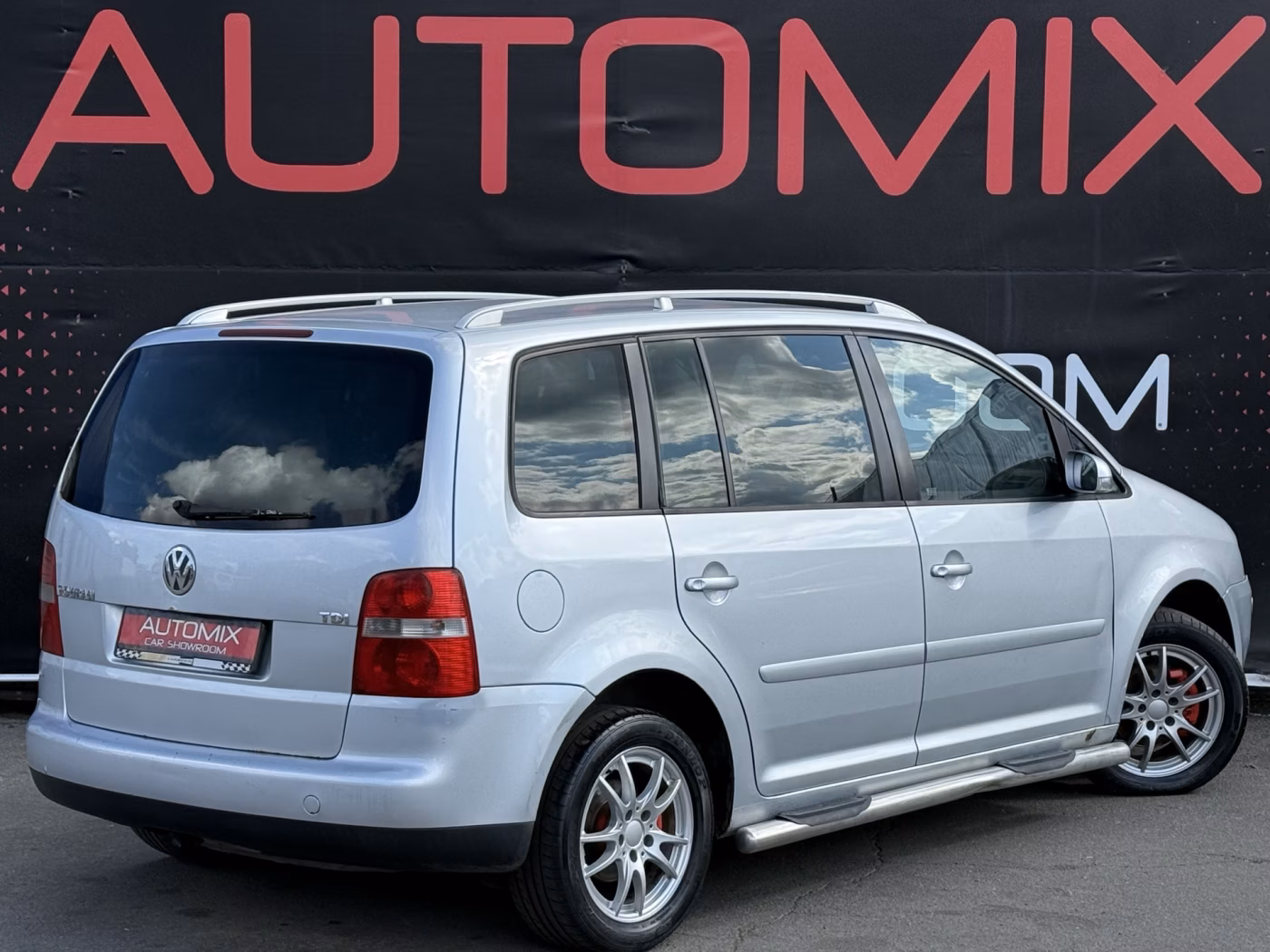 Volkswagen Touran фото 6