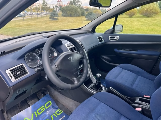 Peugeot 307 фото 9