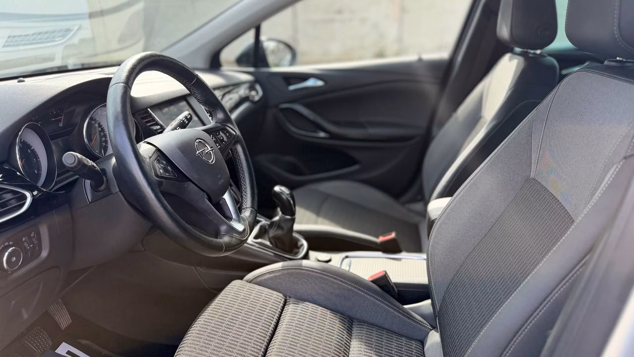 Opel Astra фото 11