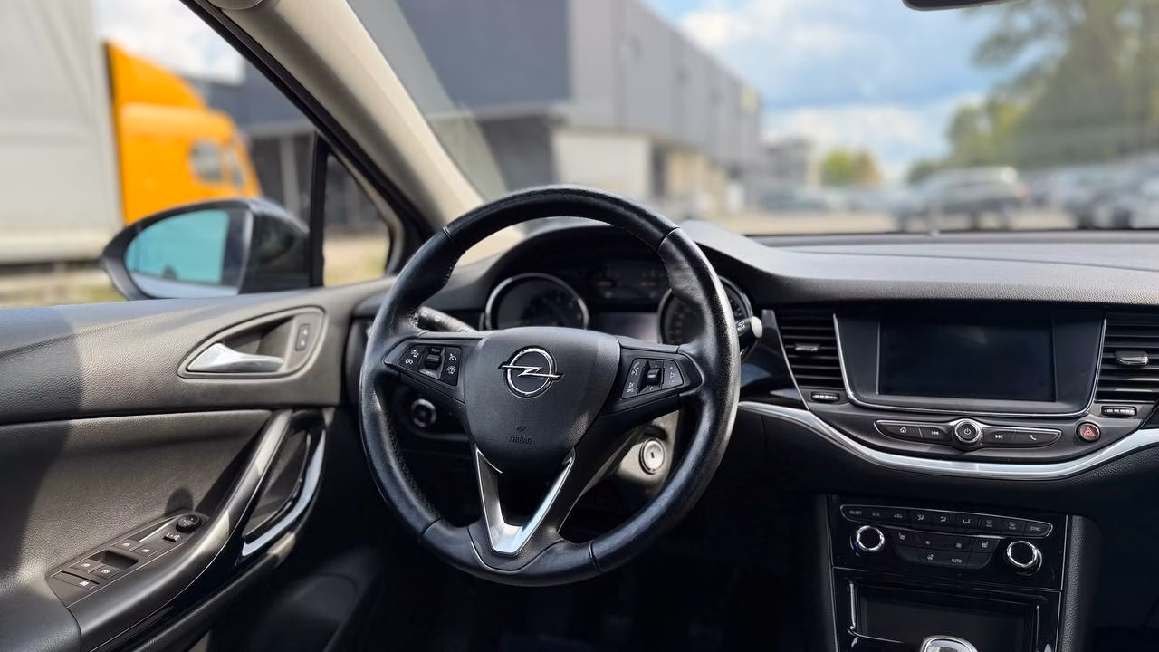 Opel Astra фото 18