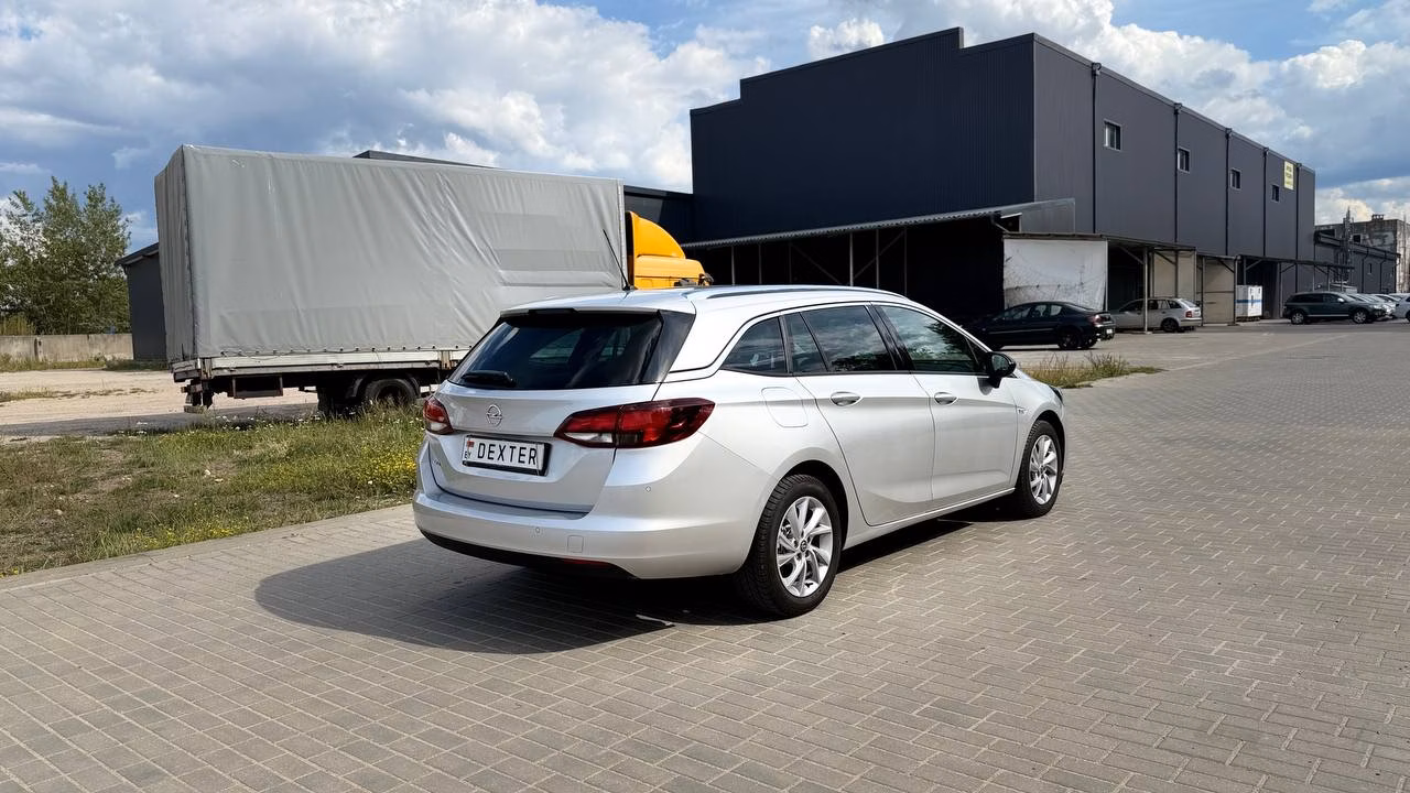Opel Astra фото 8