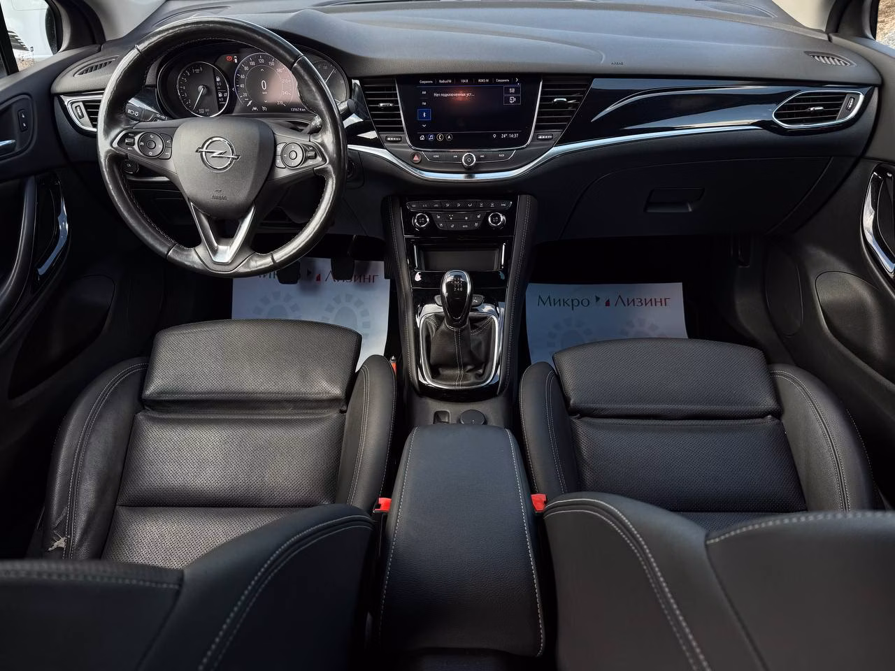 Opel Astra фото 11