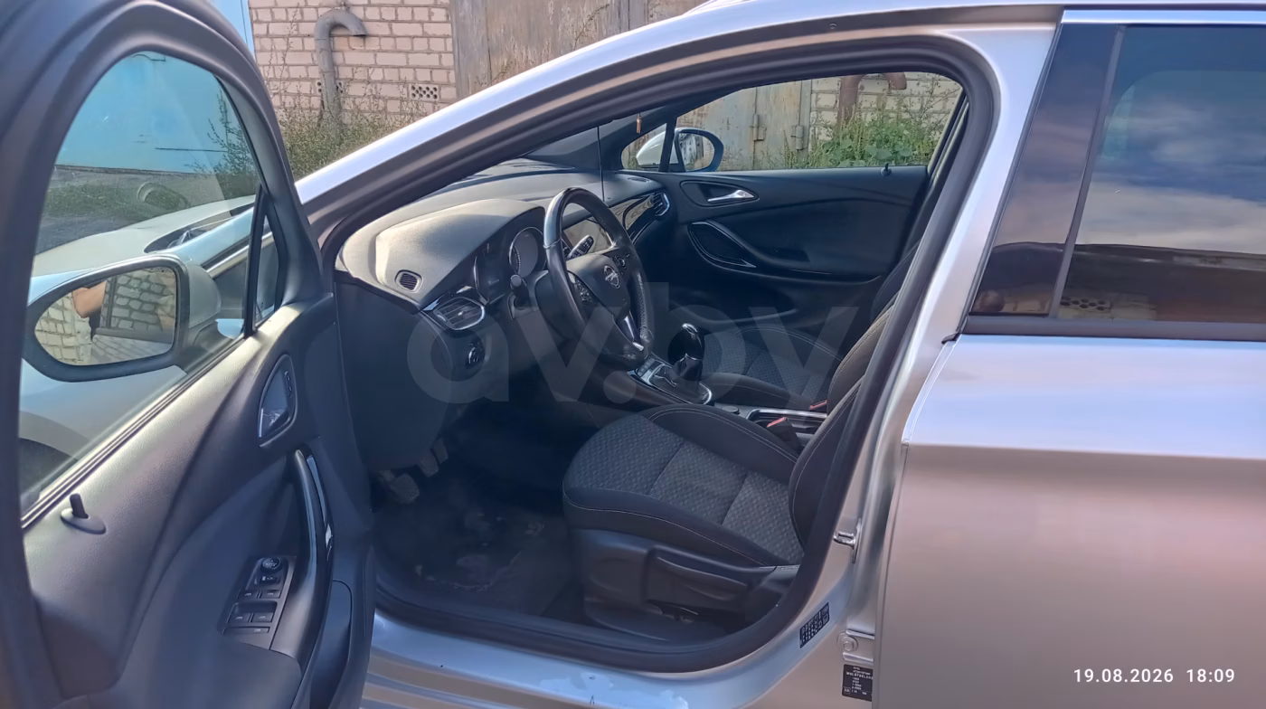 Opel Astra фото 19