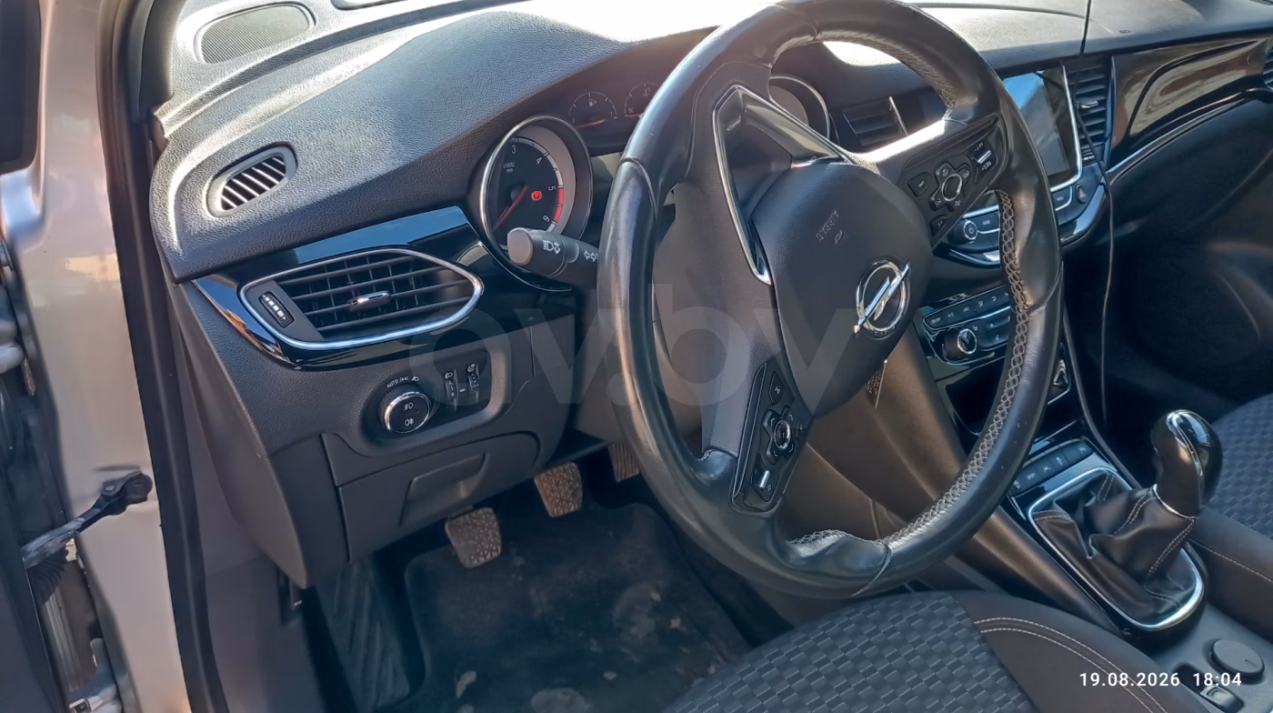 Opel Astra фото 10