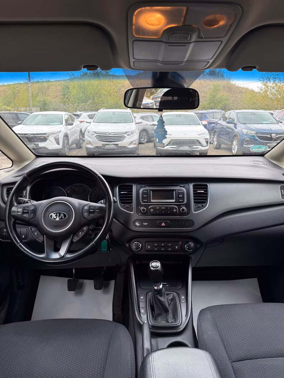Kia Carens фото 11