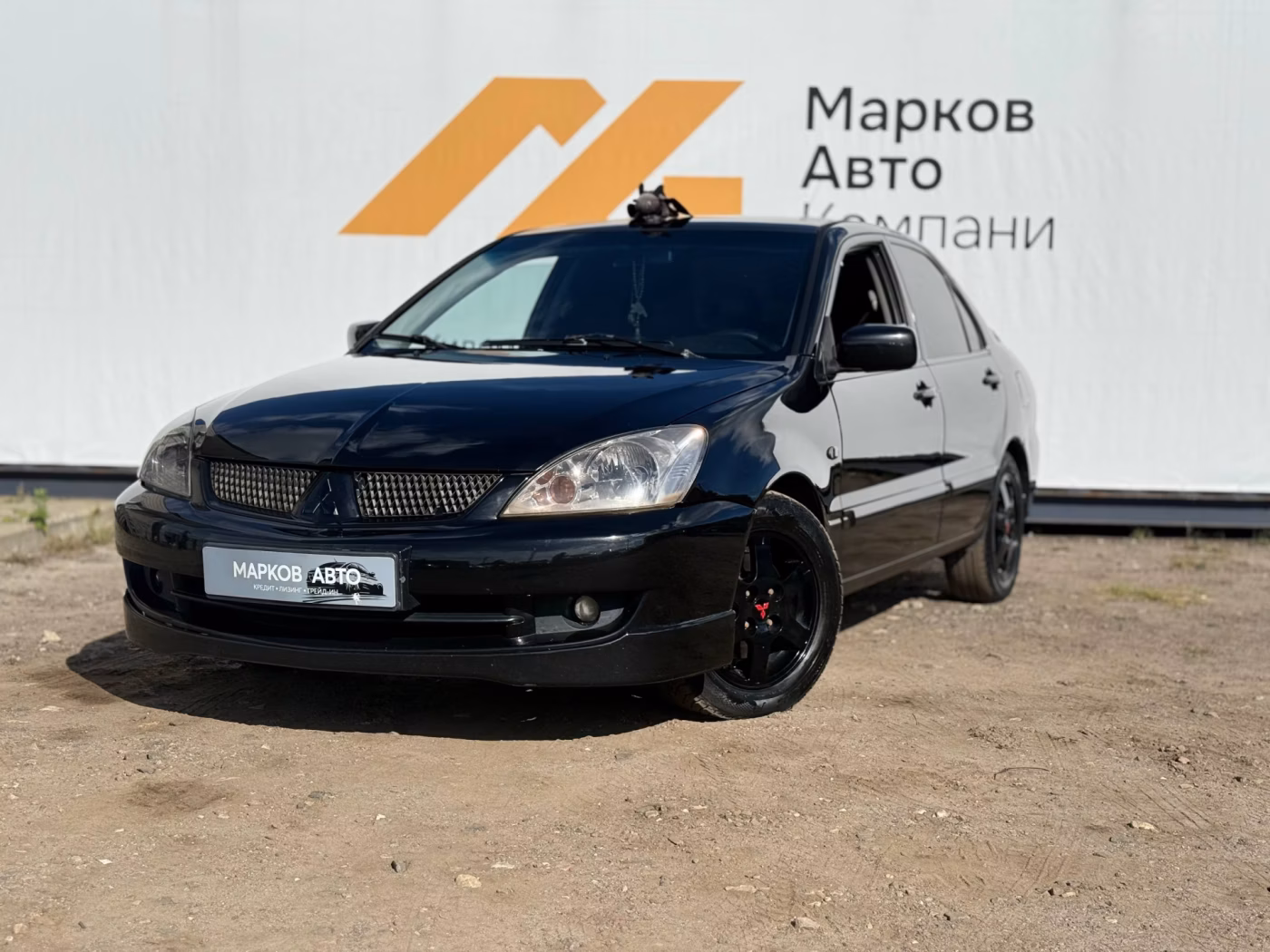 Mitsubishi Lancer фото 3
