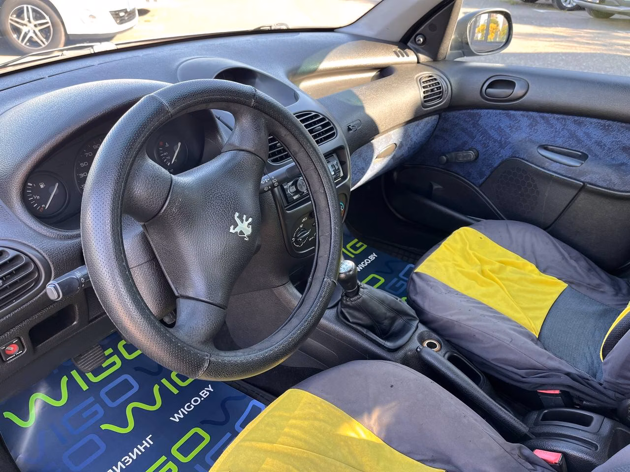 Peugeot 206 фото 10
