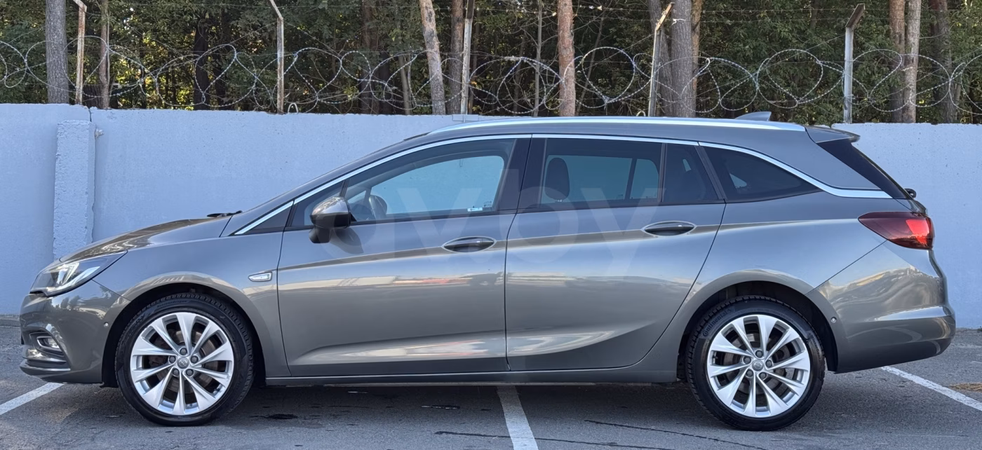 Opel Astra фото 7