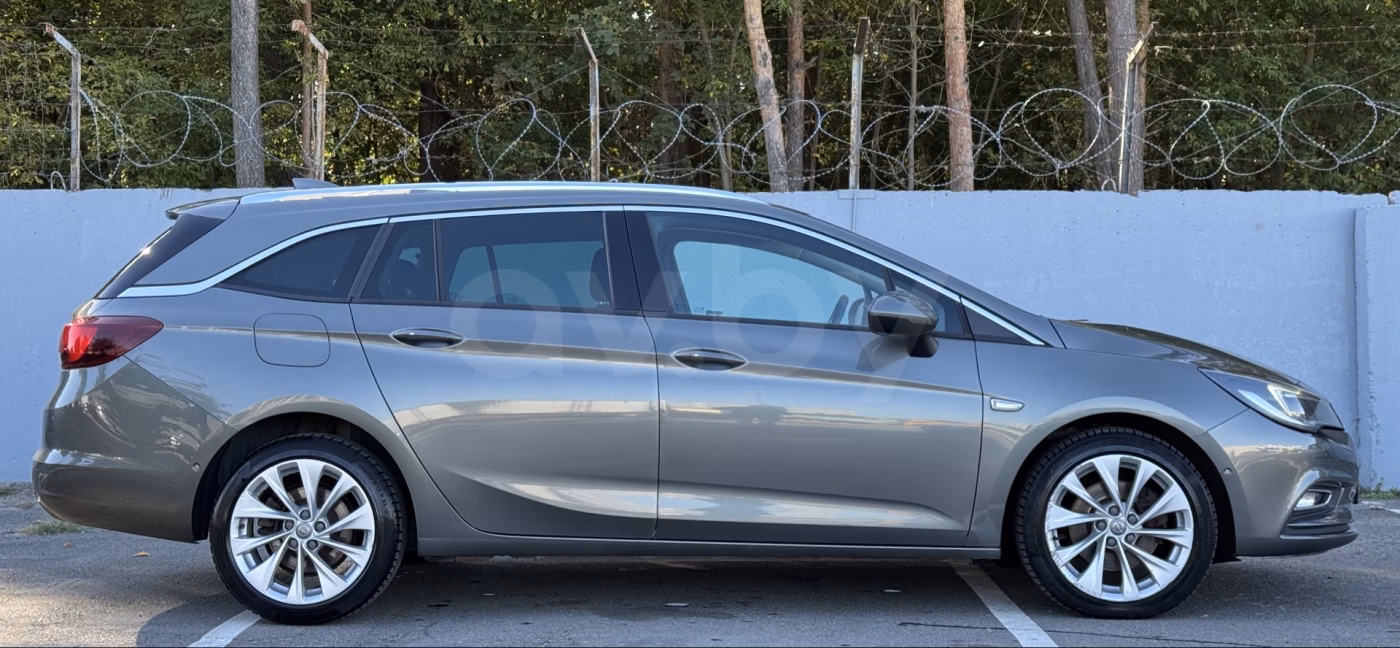 Opel Astra фото 8