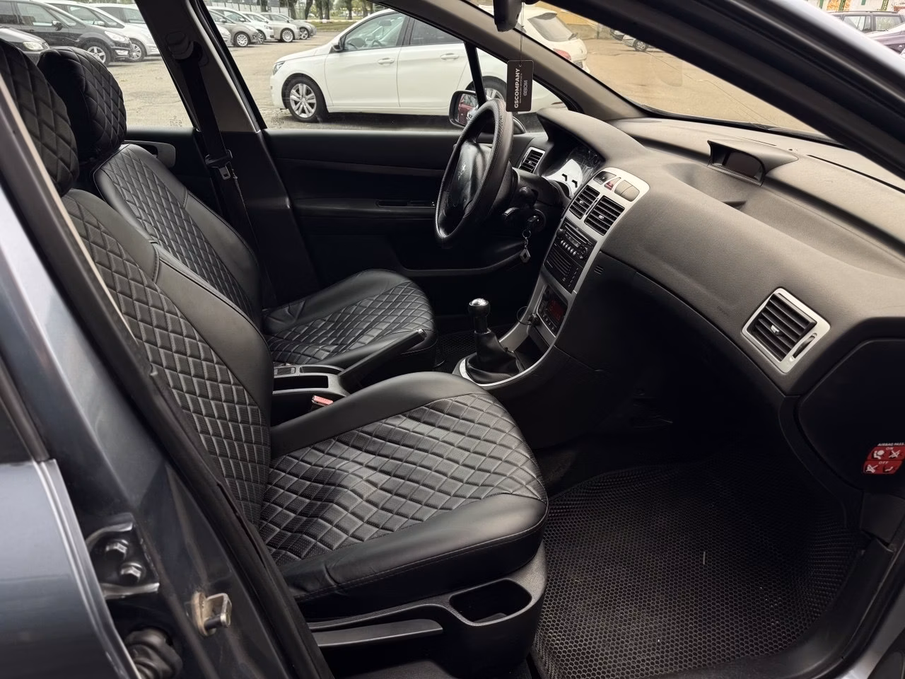 Peugeot 307 фото 9