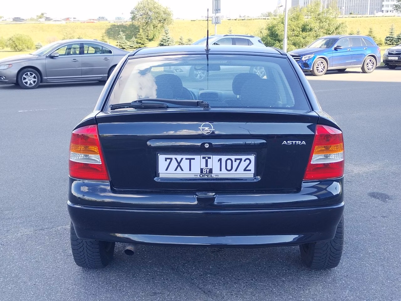 Opel Astra фото 8