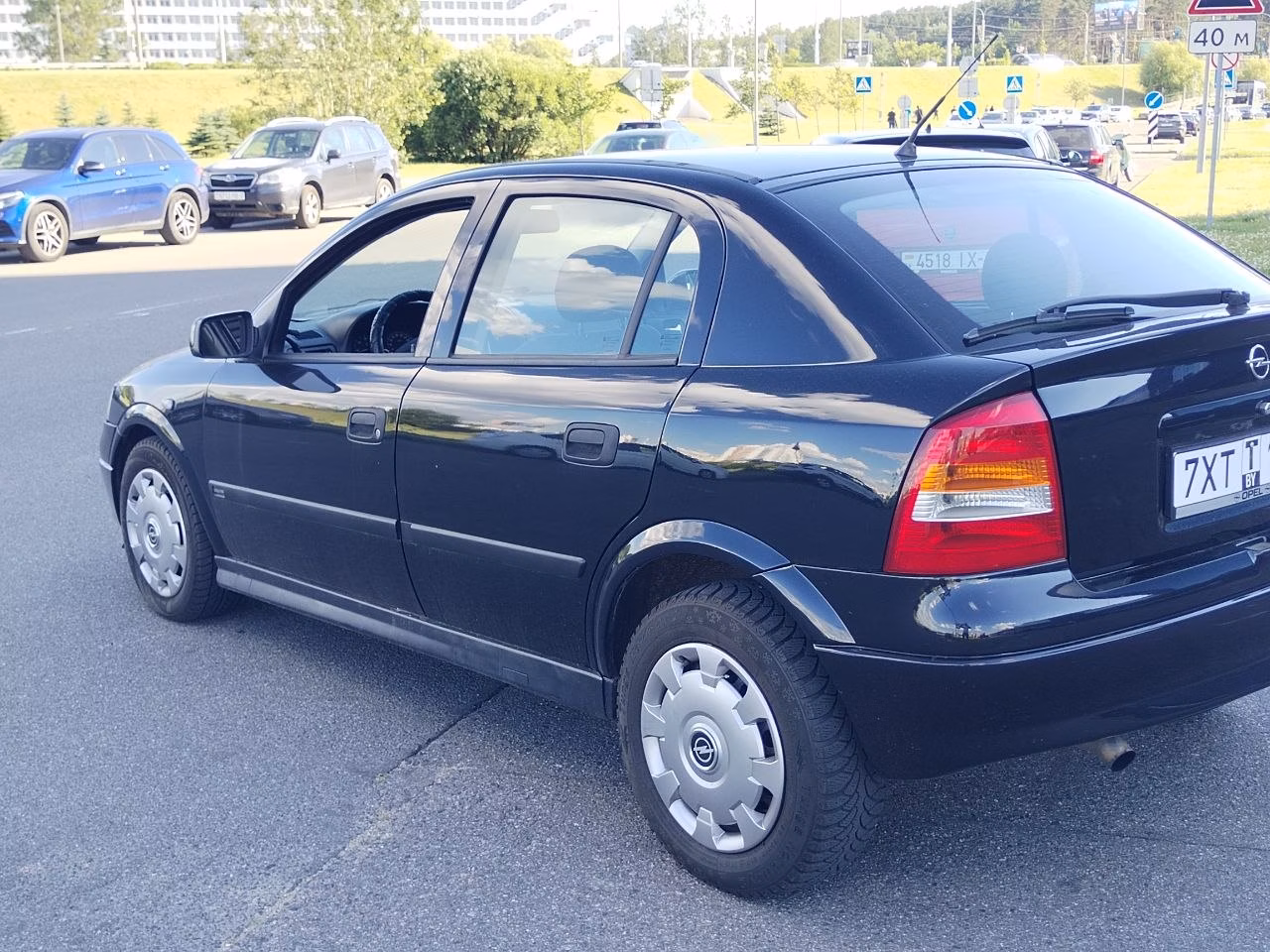 Opel Astra фото 6