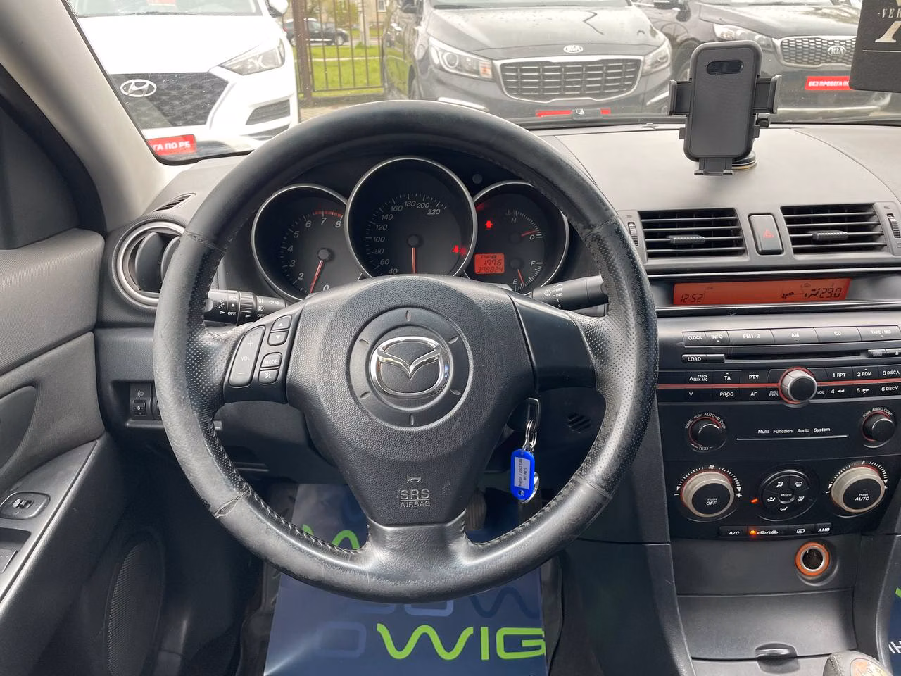 Mazda 3 фото 2