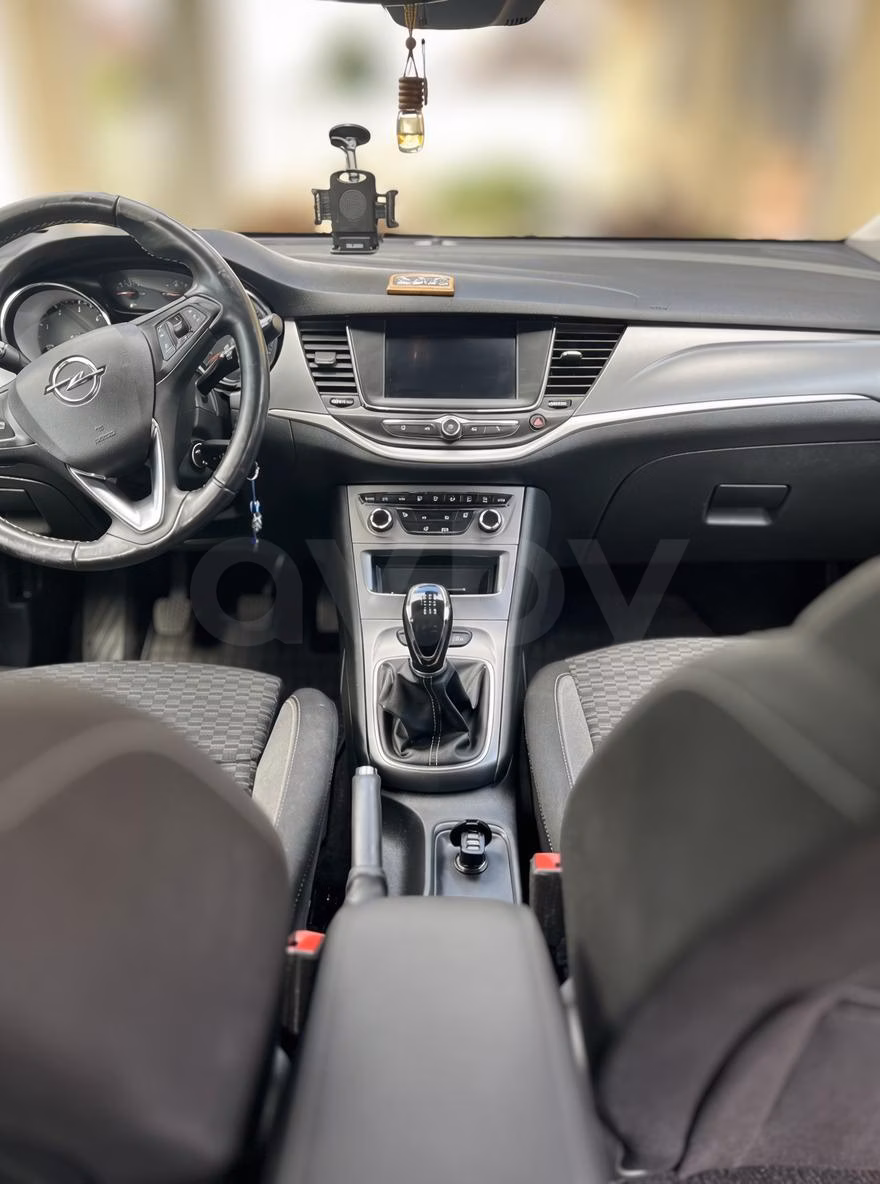 Opel Astra фото 9