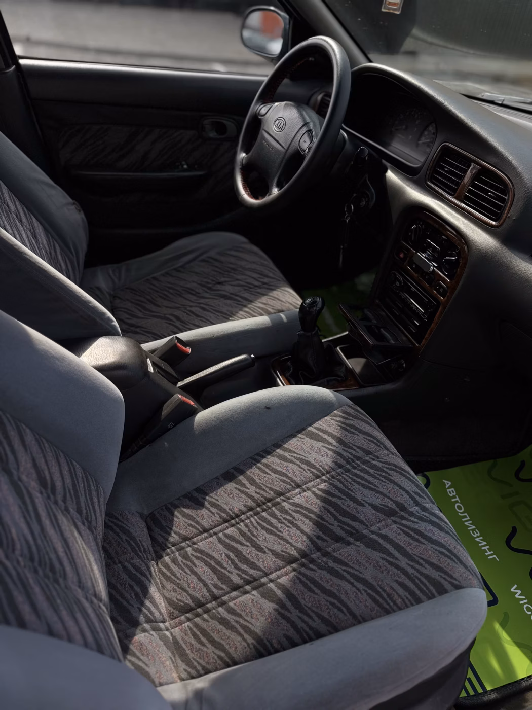 Kia Clarus фото 16