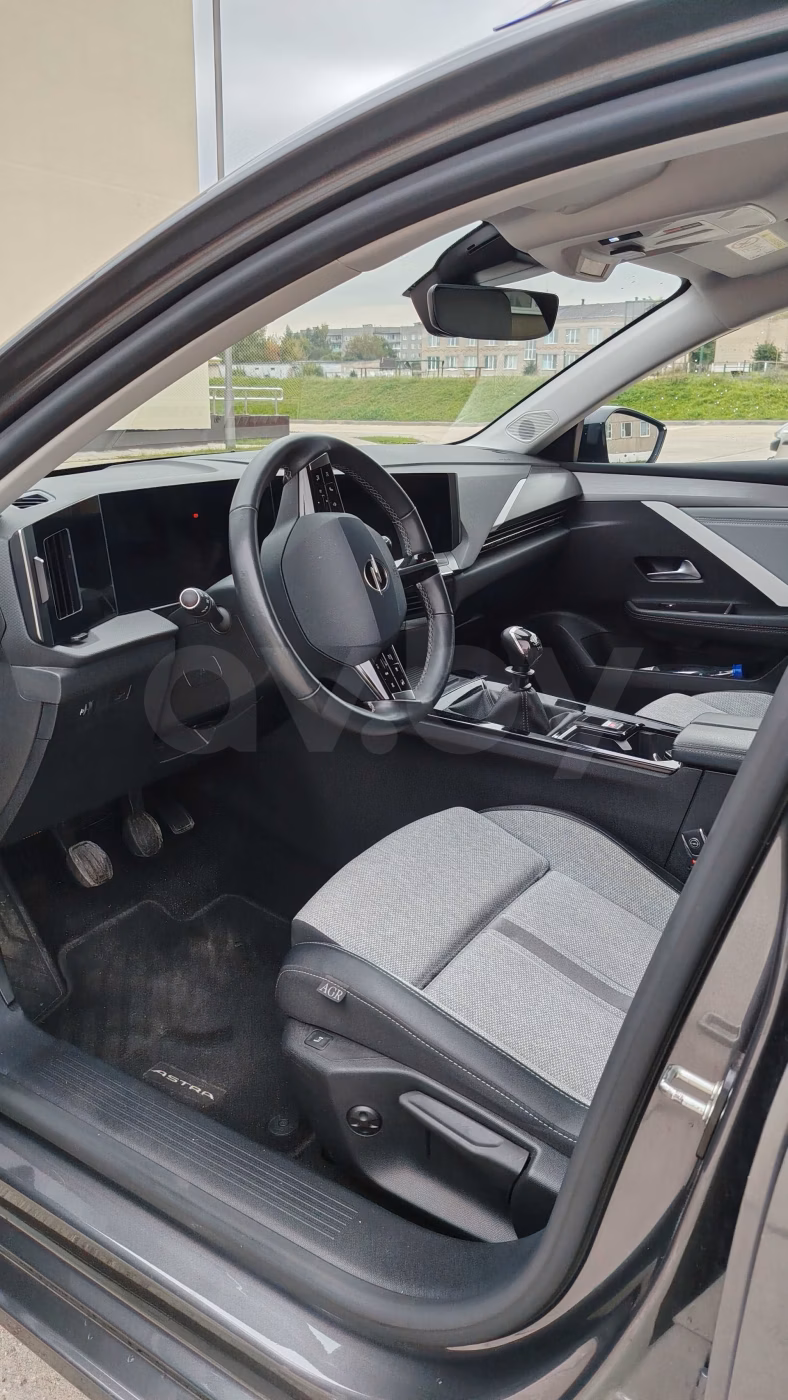 Opel Astra фото 7