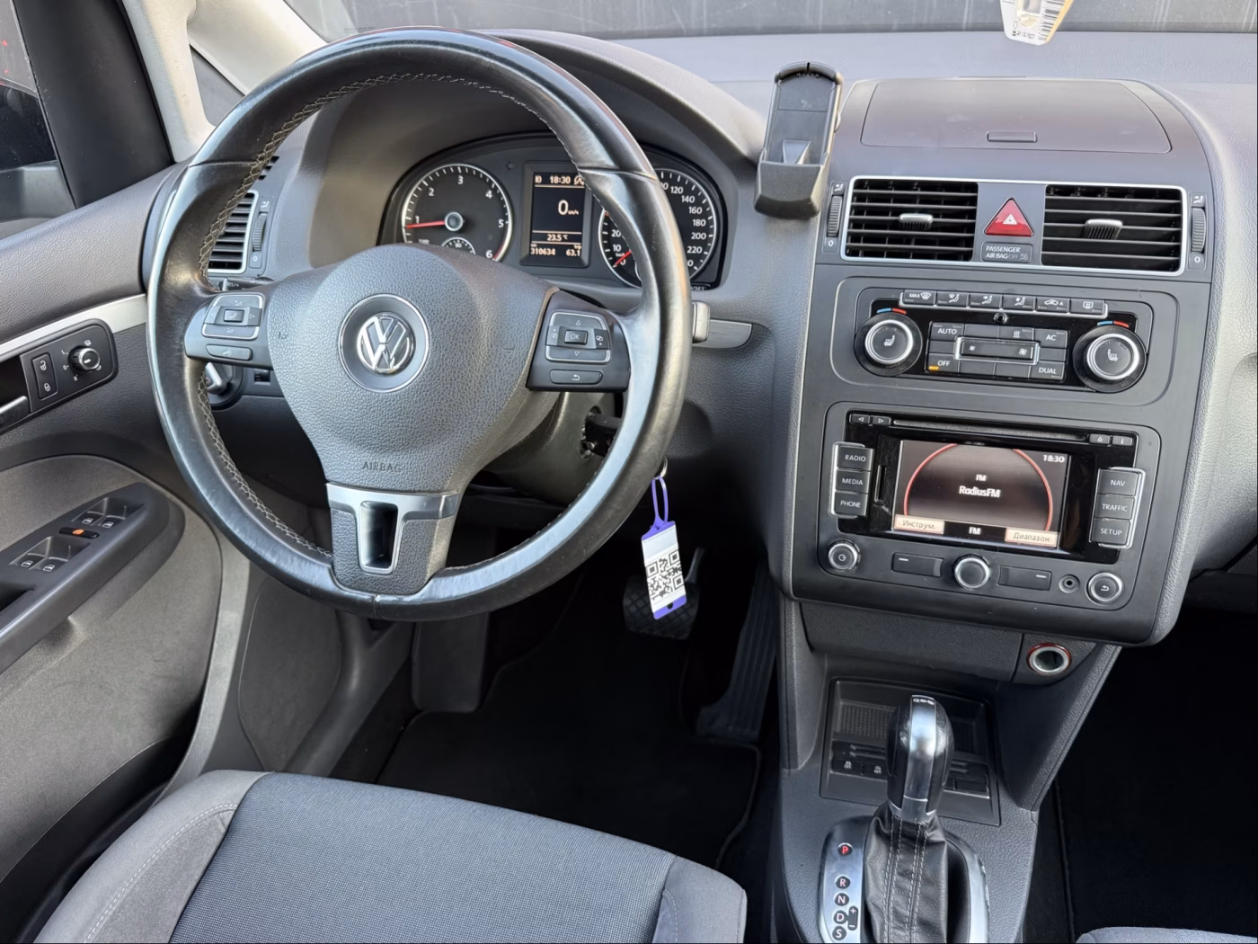 Volkswagen Touran фото 11
