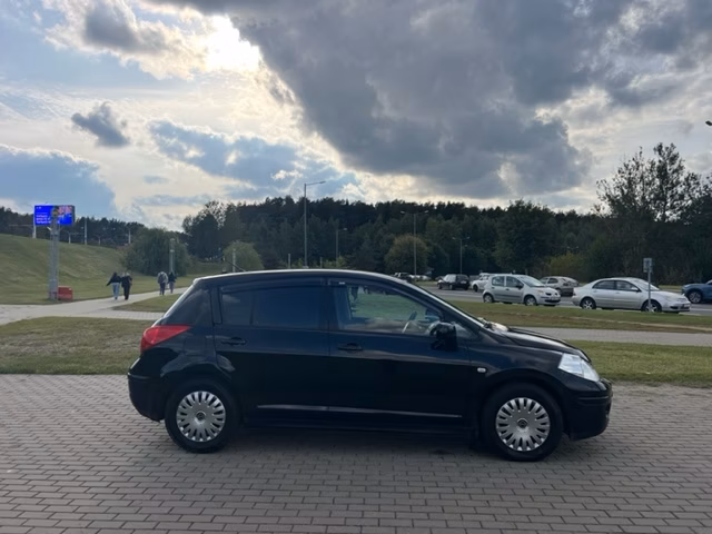 Nissan Tiida фото 4