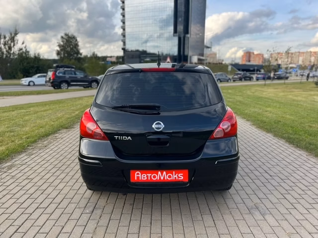 Nissan Tiida фото 6