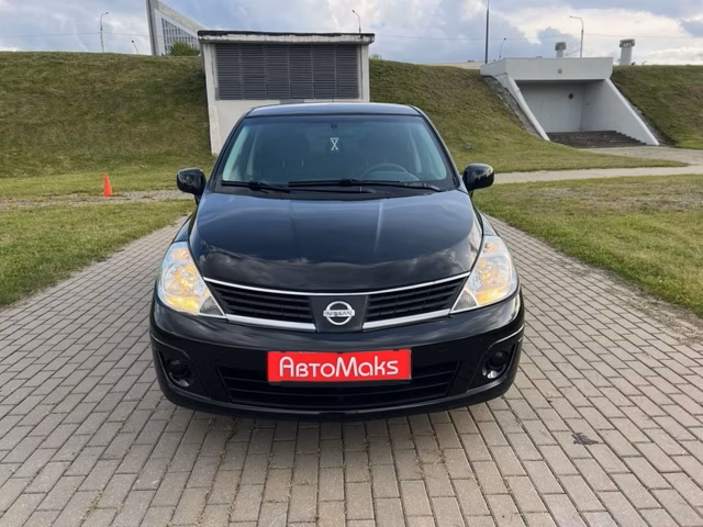 Nissan Tiida фото 2