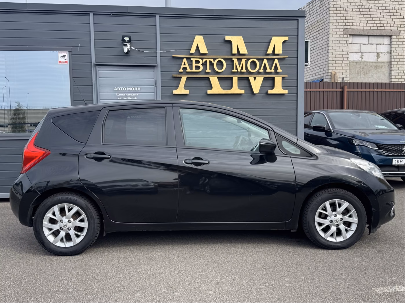 Nissan Note фото 7