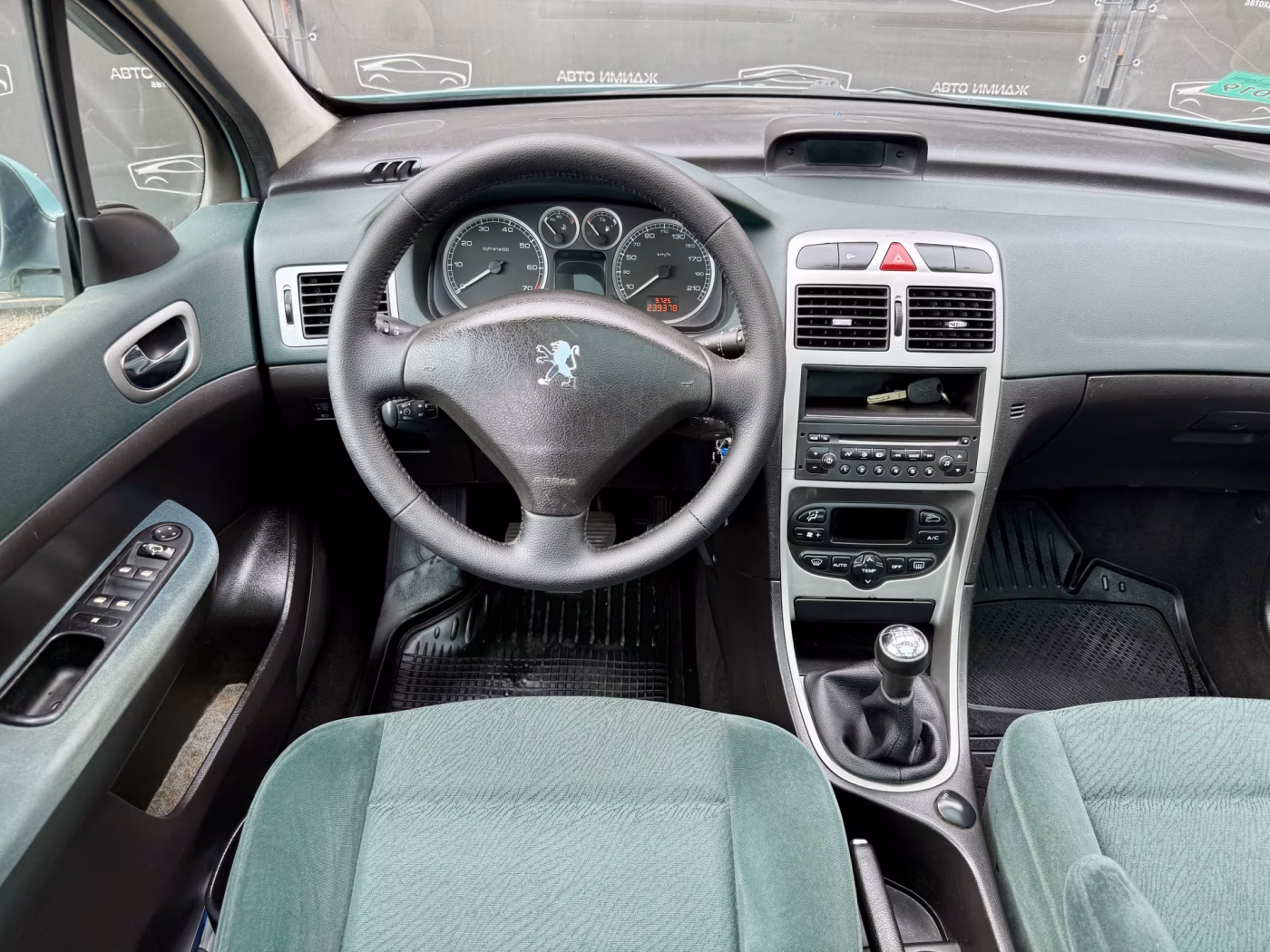 Peugeot 307 фото 16