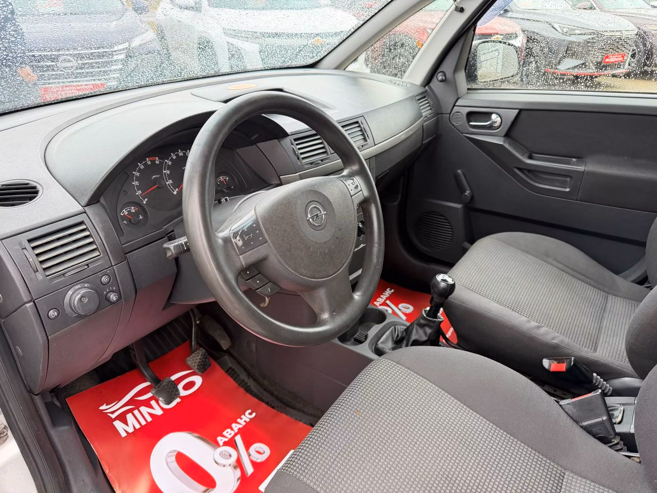 Opel Meriva фото 9