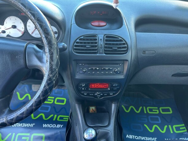 Peugeot 206 фото 11