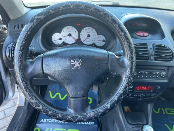 Peugeot 206 фото 10