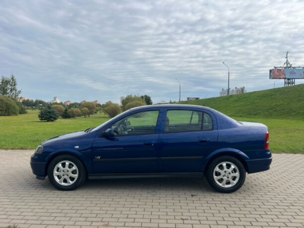 Opel Astra фото 8